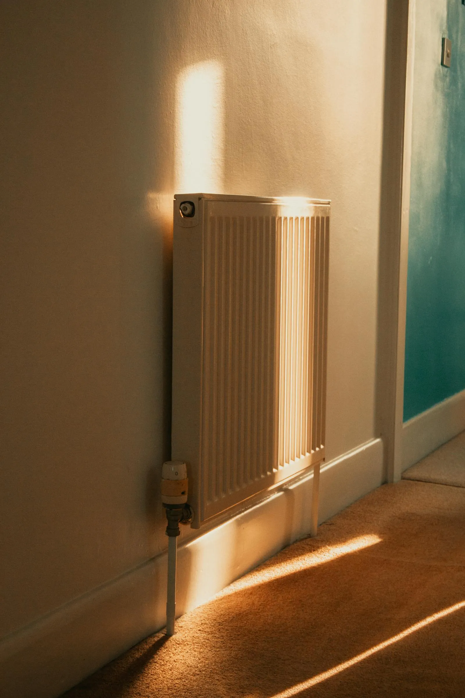 A radiator in a period room — the cooler the water flowing through it, the more efficiently a heat pump runs.